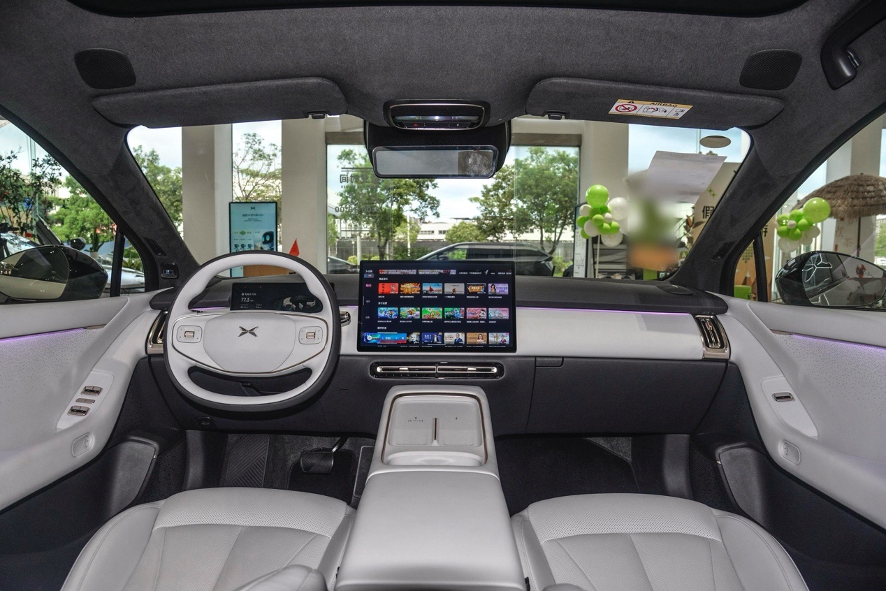 On the car seatDescription has been automatically generated.